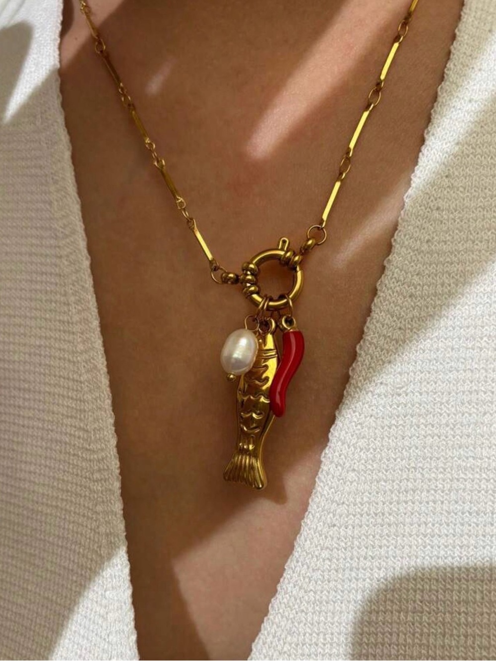 Gold-Tone Fish Charm Necklace with Red Accent and Pearl